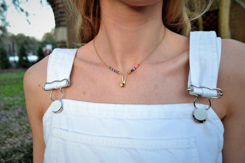 ACL peace necklace